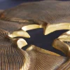 Dekorativer Couchtisch GINKGO 95cm gold schwarz handmade Metall