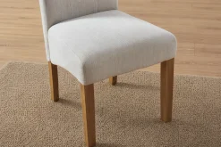 Design Stuhl CASA beige Leinen Massivholzbeine mit Zierknöpfen und Nackenrolle