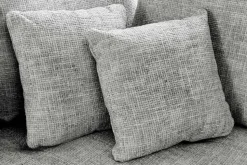 Moderne Wohnlandschaft KENT 220cm grau Strickstoff Ecksofa inkl. Hocker und Kissen